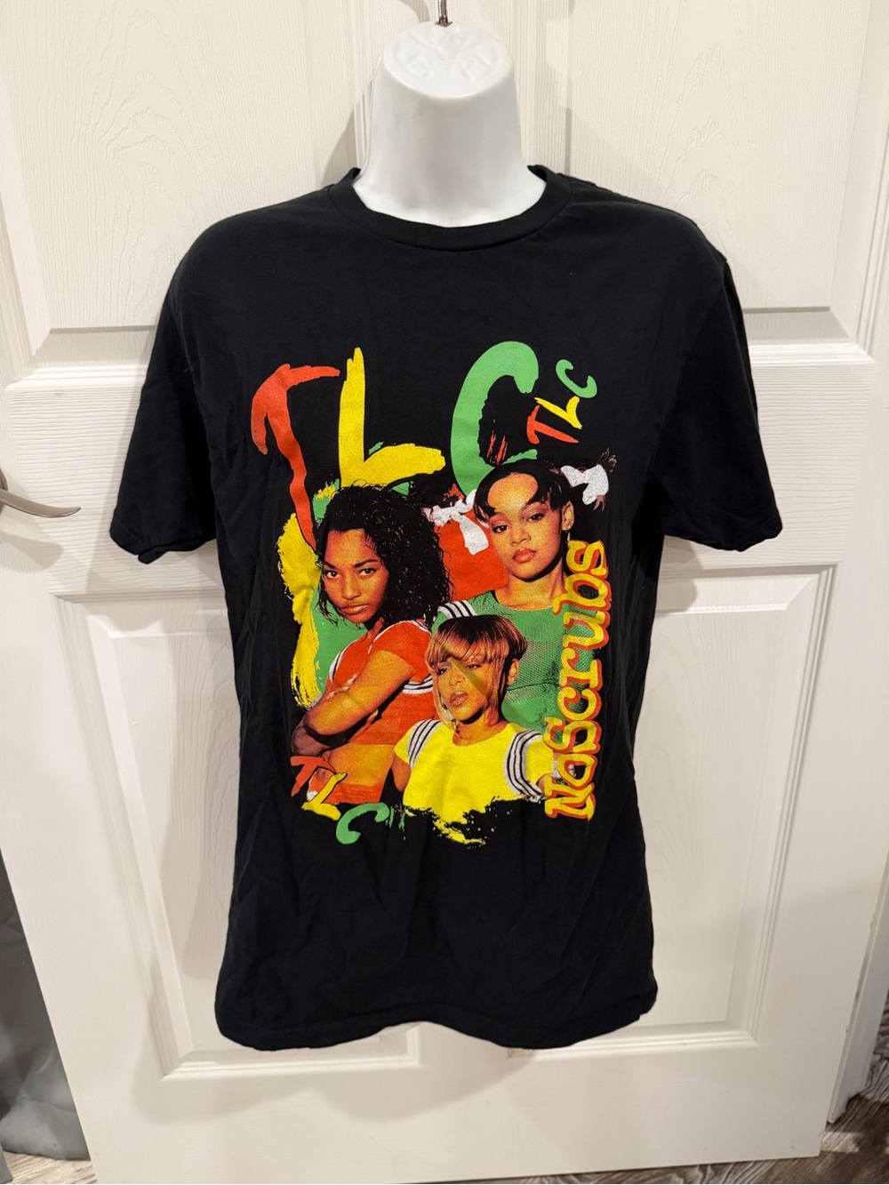 TLC Black Tee with Green, Yellow & Red Graphic